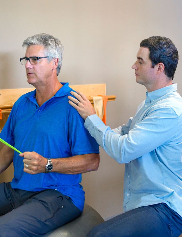 Oceanside Physiotherapist working with client