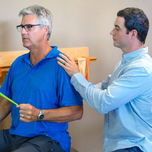 Oceanside Physiotherapist helping client