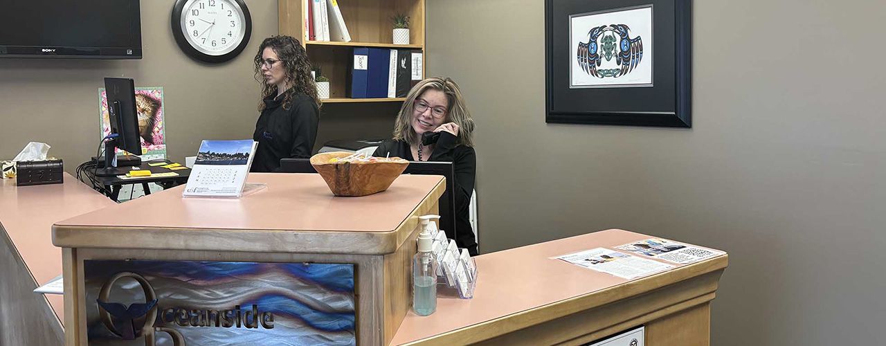 Receptionists calling clients at Oceanside Physiotherapy