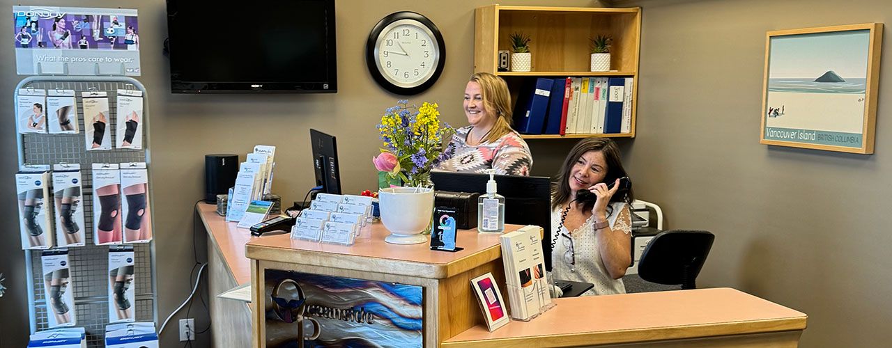 Receptionists calling clients at Oceanside Physiotherapy